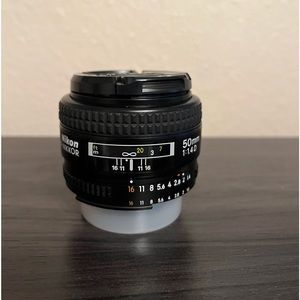 Nikon AF Nikkor 50mm f/1.4D. Excellent condition.  Used once.